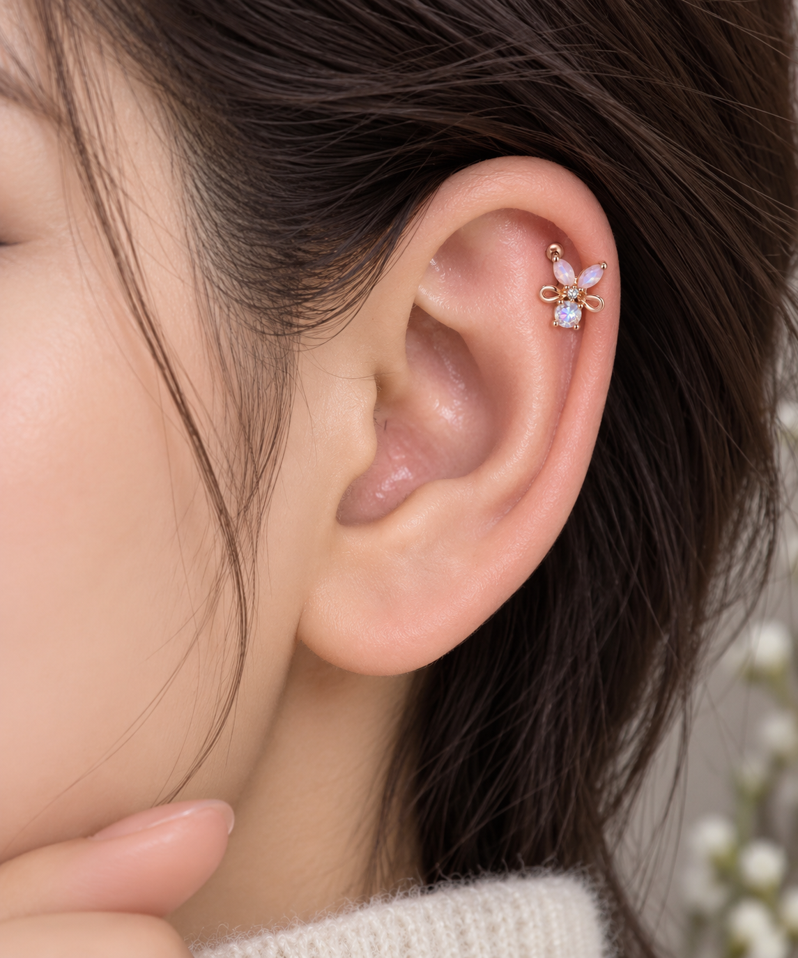 Rose Gold Butterfly Ear Piercing