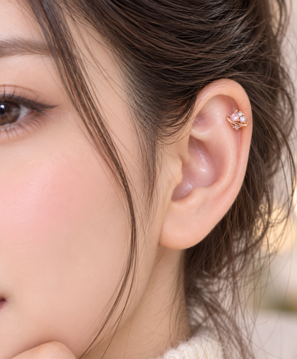 Rose Gold Planet Ear Piercing