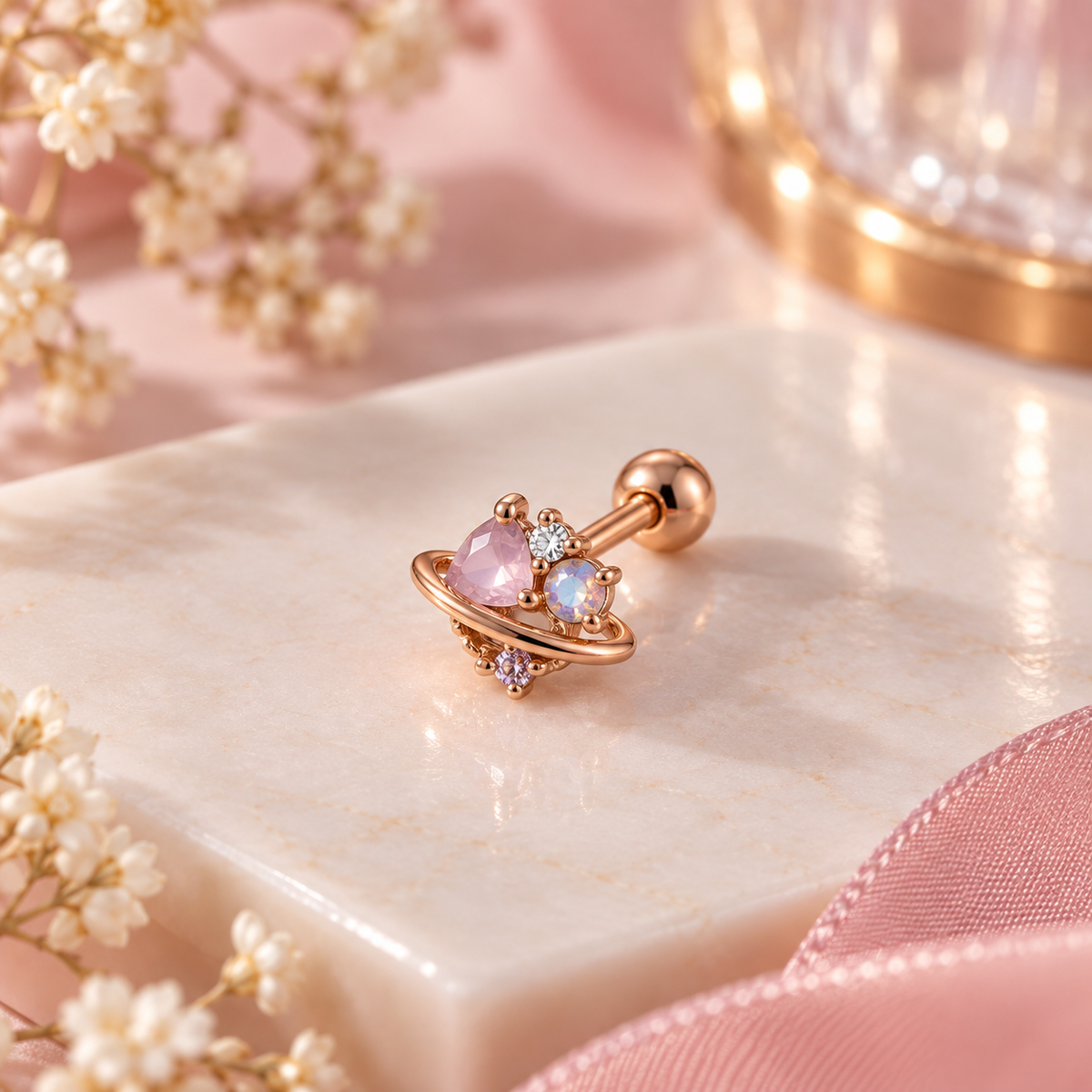 Rose Gold Planet Ear Piercing
