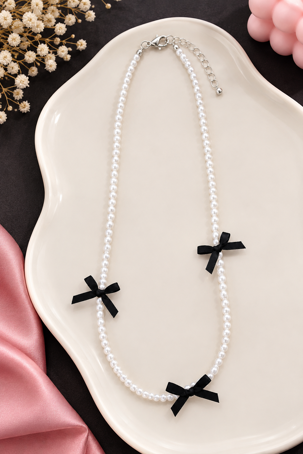 White Pearl Beaded Necklace with Black Bow Charms